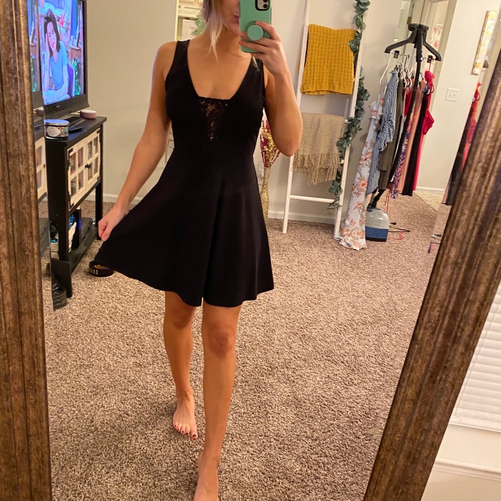 Small Black Swan dress with lace detail